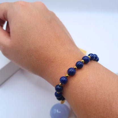 Bracelet Lapis Lazuli 6mm avec des perles dorées 3mm et un tour de poignet 17cm