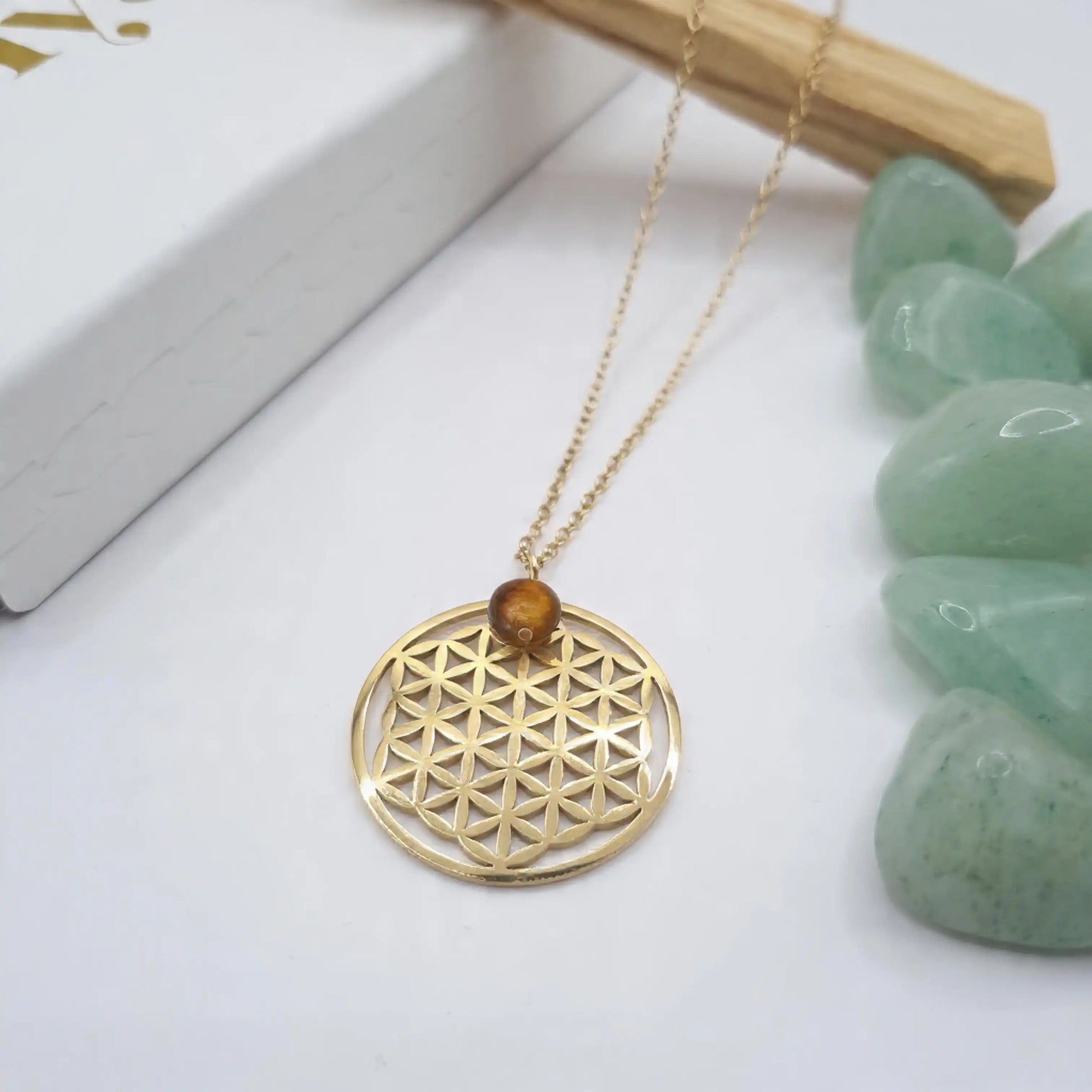 collier fleur de vie oeil de tigre acier inoxydable avec dorure or 18k