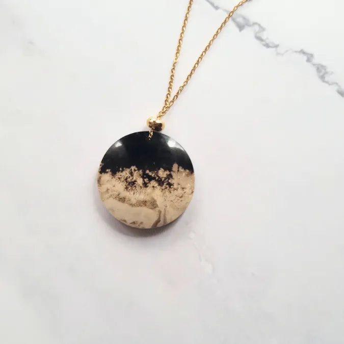 pendentif palmier fossil beige rond MystikBox