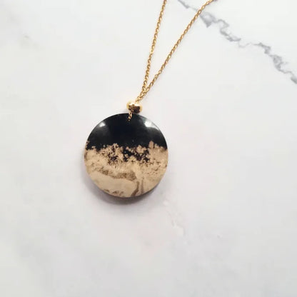 pendentif palmier fossil beige rond MystikBox