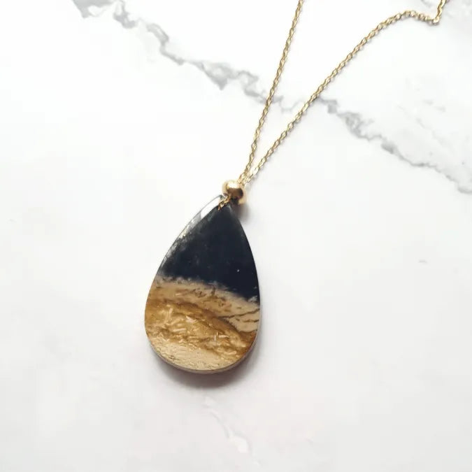 pendentif palmier fossil dore goutte MystikBox
